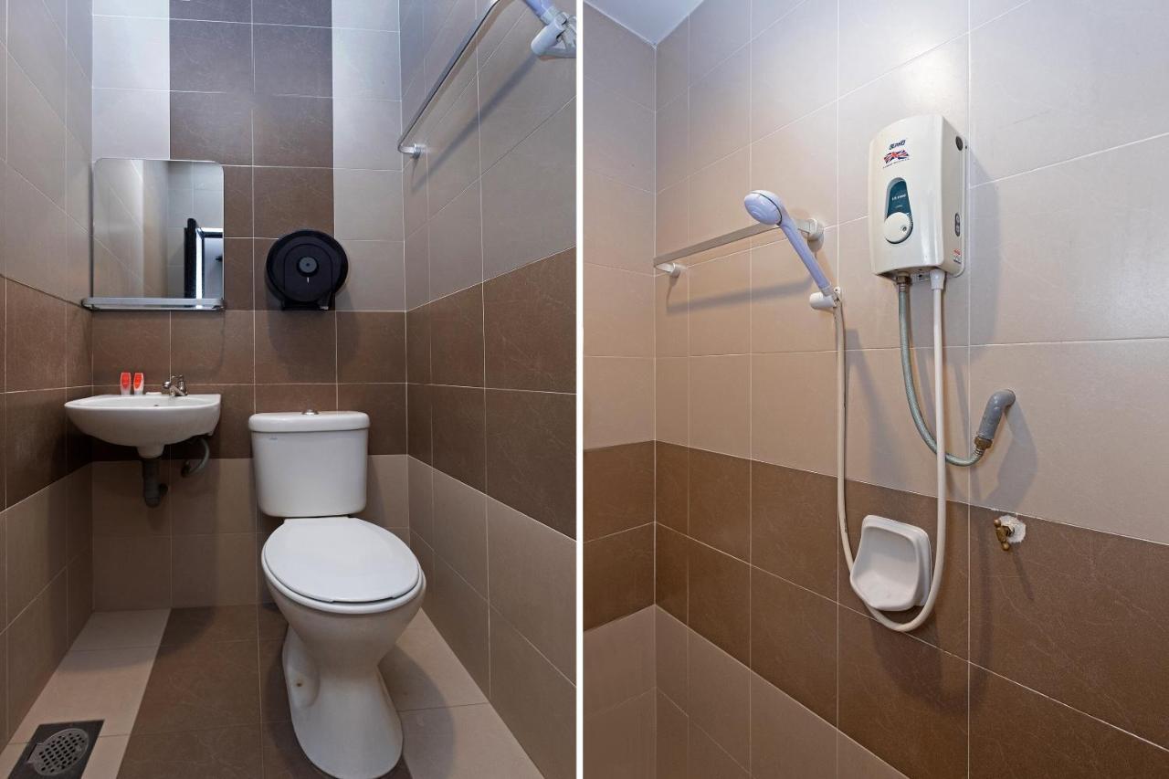 Oyo 90050 V Hotel Телук Интан Екстериор снимка